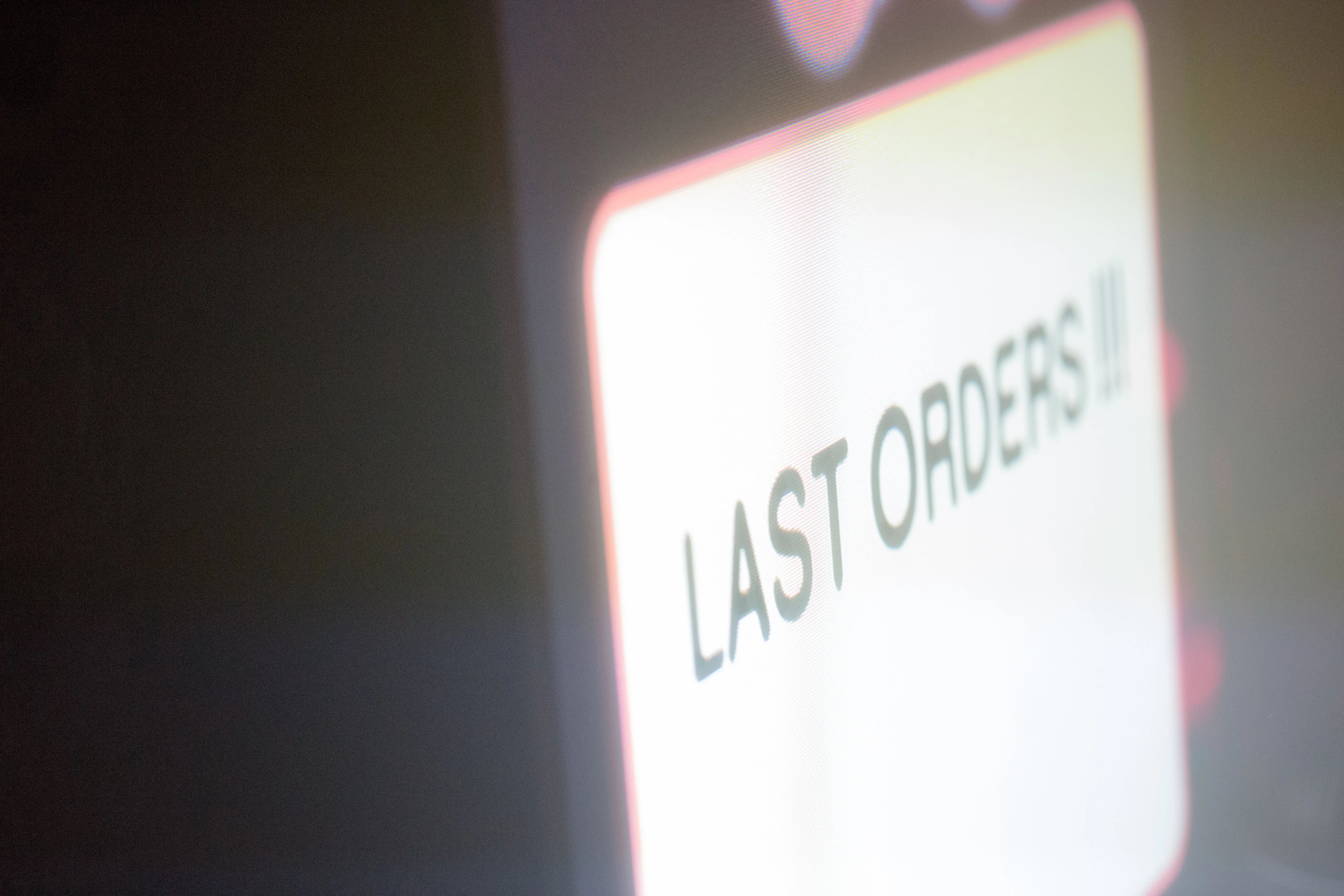 A TV shows the words LAST ORDERS!! Used a a way to communicate with clubbers throughout the night