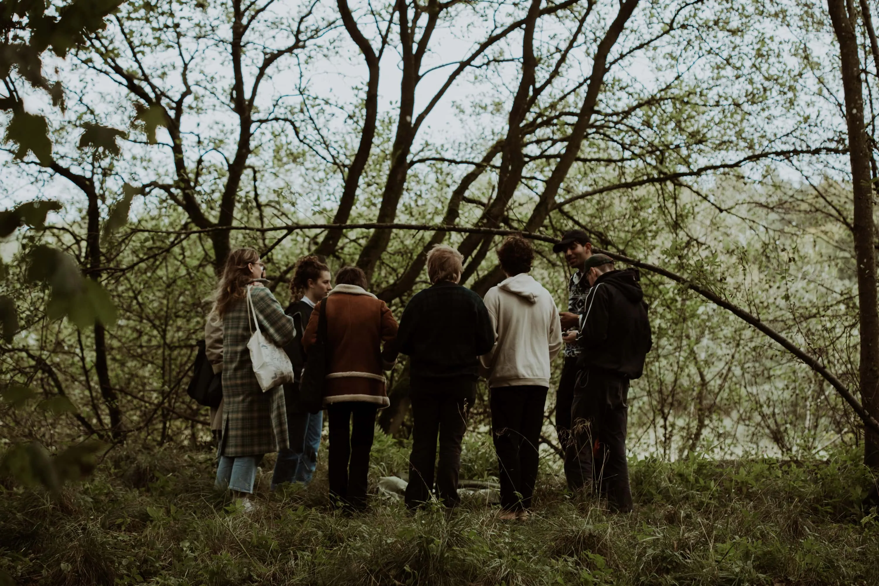 A group gather round SwampNET in the swamp